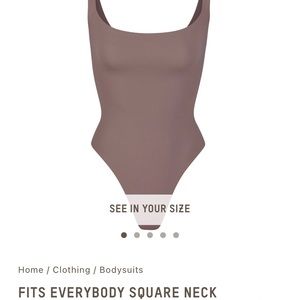 Never been worn. Color “umber”. Tags still on.